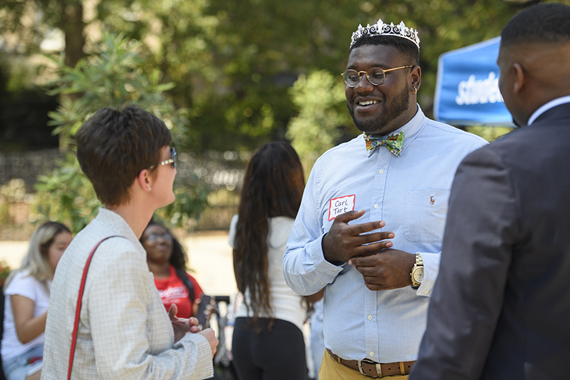 Carl Tart speaks with UM administrators.