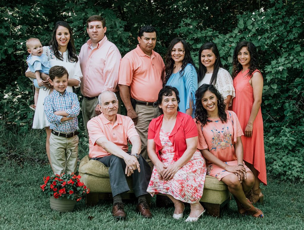 Melissa Reyes poses with a group picture with her extended family.