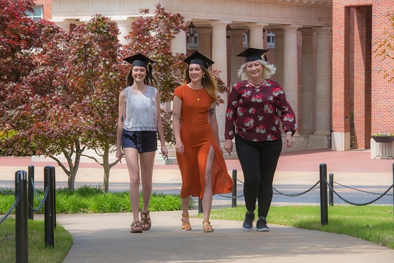 Cindy, Patricia and Emily walk on the Ole Miss campus.