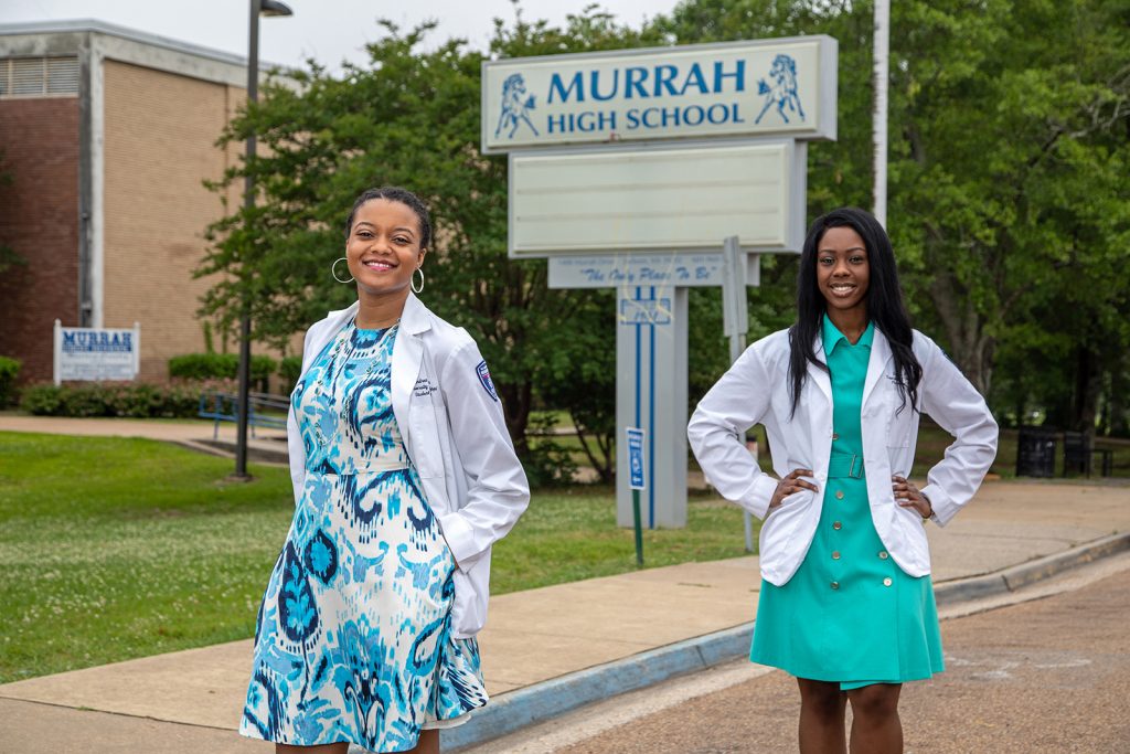 Andrea Washington and Brianca Fizer pose for a photo.