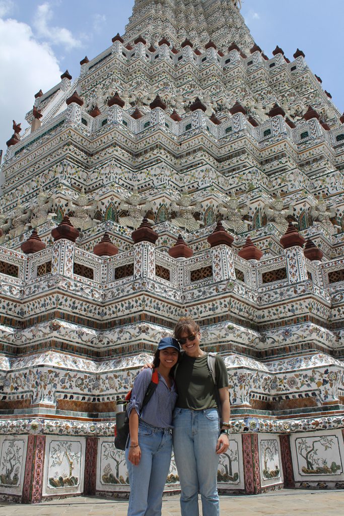 Blythe poses for a photo outside a temple in Bangkok.