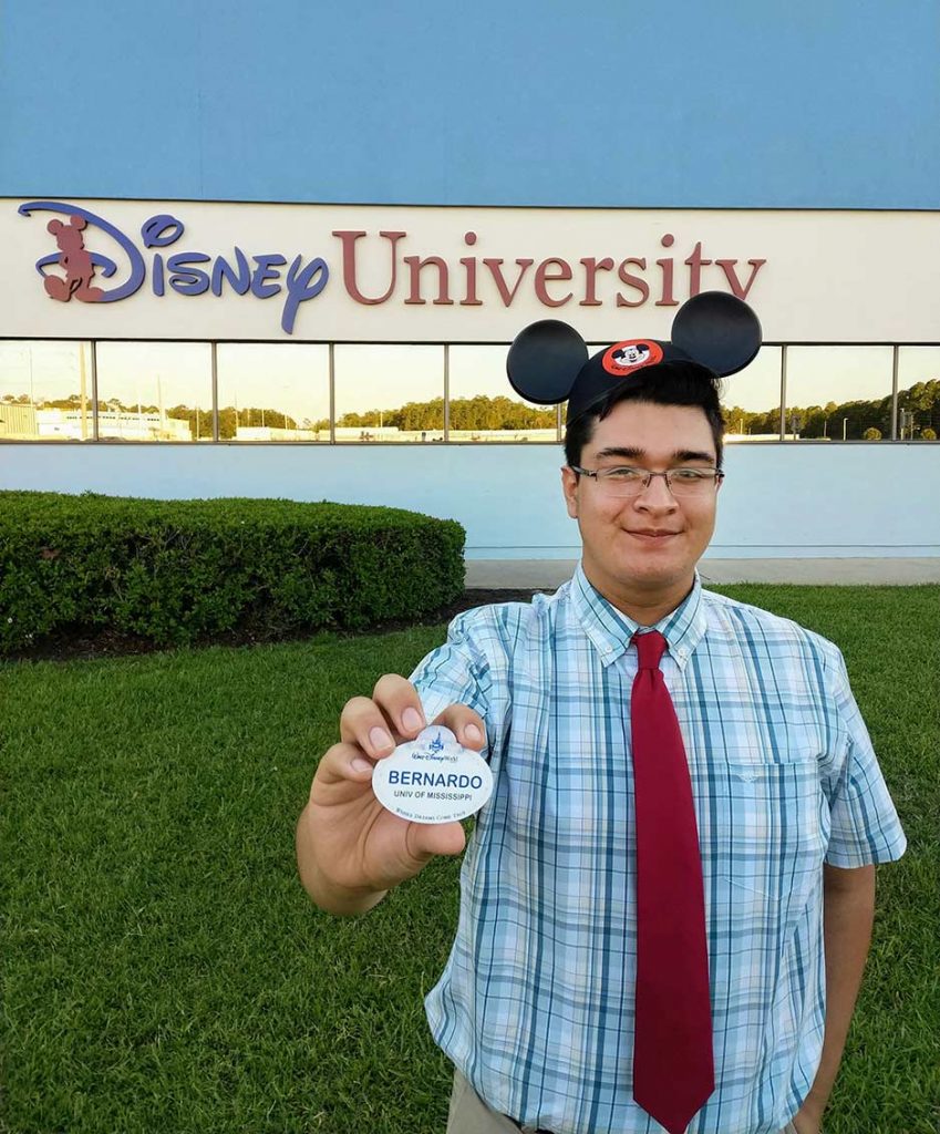 Bernardo Guerro celebrates the completion of his training program at Disney University. The program allows students to represent their institutions by noting it on their Disney name tags. Submitted photo 