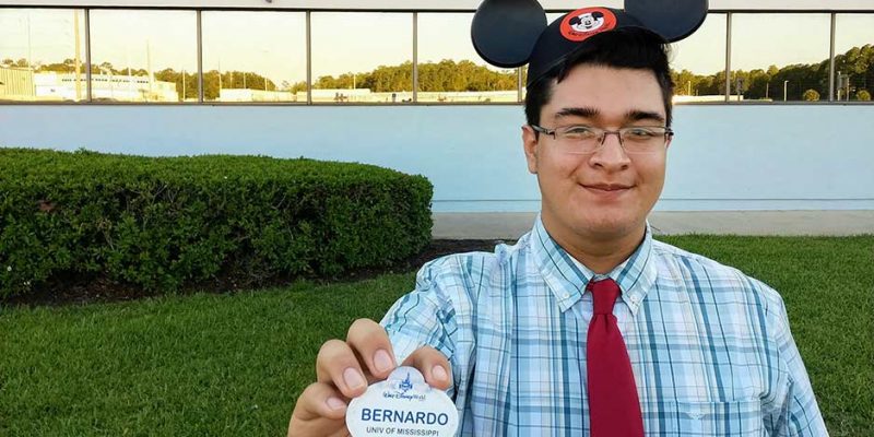 Bernardo Guerro celebrates the completion of his training program at Disney University. The program allows students to represent their institutions by noting it on their Disney name tags. Submitted photo