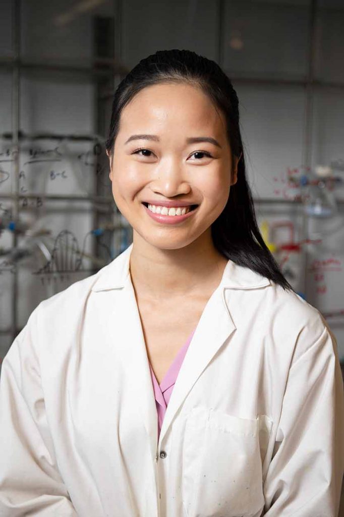 Qing Ivy Li in lab coat
