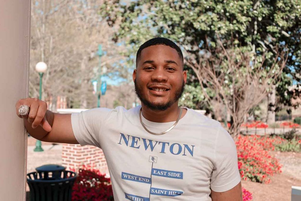 Evans wears a shirt from his company, Black Collections LLC. The shirt represents his connection to Ole Miss along with his roots to his hometown of Newton. Submitted photo