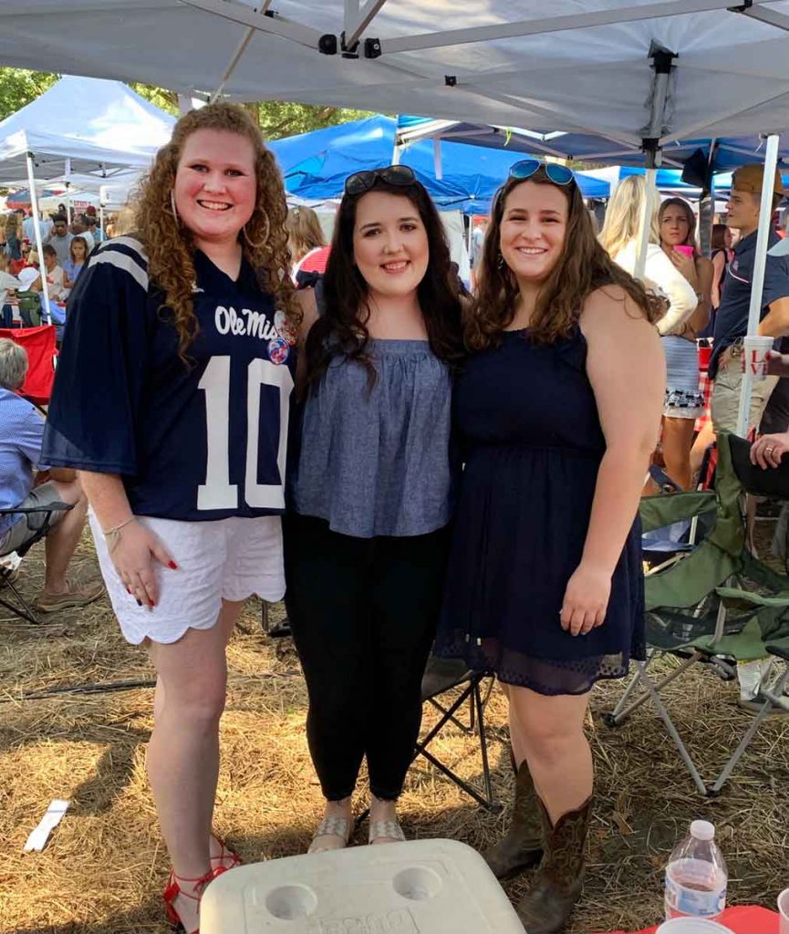 Heinen tailgating in the Grove with friends, Emma Schrotenboer (left) and Emily Morphis (middle). Submitted photo