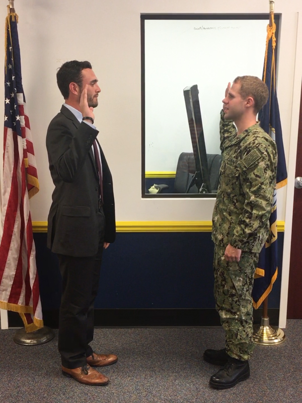 n a personal swearing-in ceremony, Dodd takes the oath of office for the U.S. Navy in April 2018.