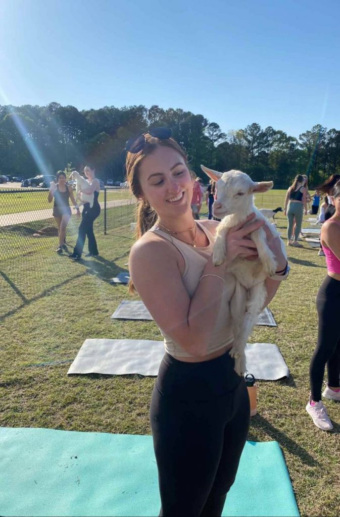 Keller participating in goat yoga at the South Campus Rec Center. Submitted photo