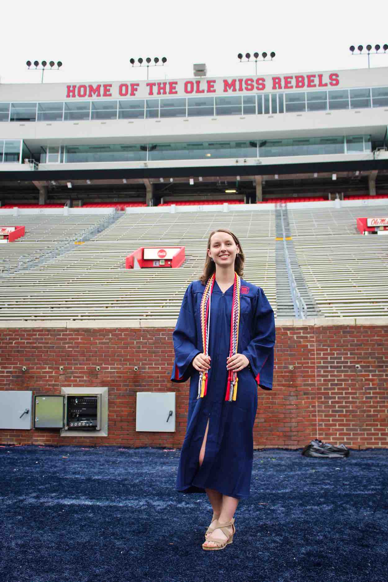 Heidi Myers takes a senior photo on the field at Vaught-Hemingway Stadium. Submitted photo